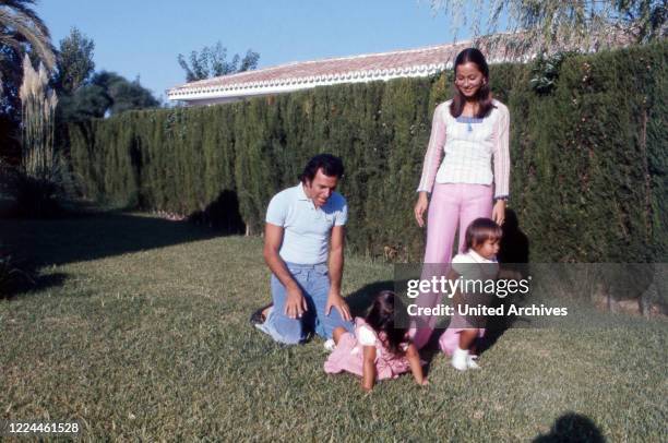 Spanish singer Julio Iglesias with his wife Isabel and the children Chabeli and Julio Jose at his home in Cadiz, Spain, 1974.