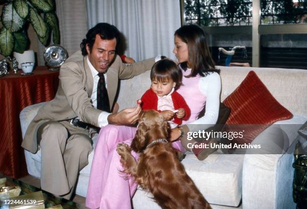 Spanish singer Julio Iglesias with his wife Isabel and daughter Chabeli at his home in Cadiz, Spain, 1974.
