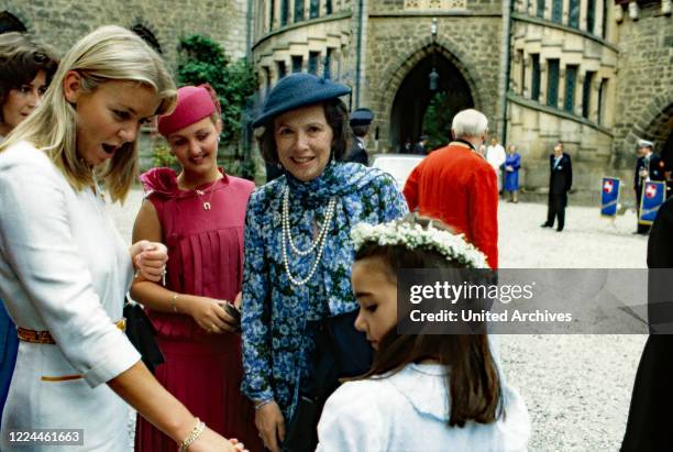 Guest of the wedding of heir to the throne Ernst August von Hanover with Chantal Hochuli at Marienburg castle near Hanover, Germany, 1981.