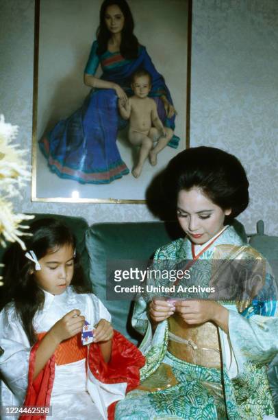 Ratna Sari Dewi Sukarno with daughter Kartika Carina, France 1970s.