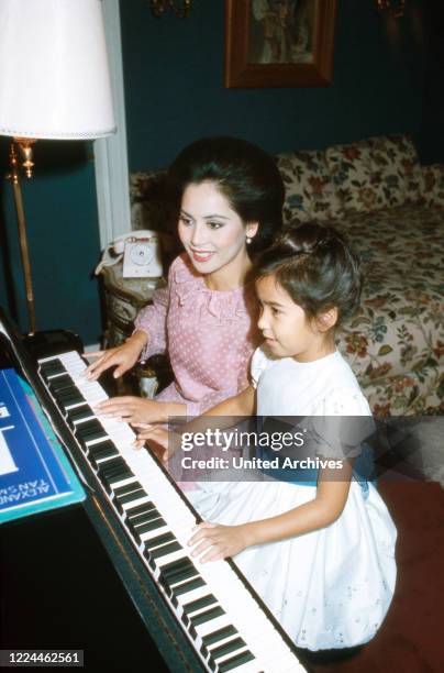 Ratna Sari Dewi Sukarno with daughter Kartika Carina, France 1970s.