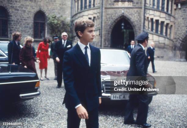 Guest of the wedding of heir to the throne Ernst August von Hanover with Chantal Hochuli at Marienburg castle near Hanover, Germany, 1981.