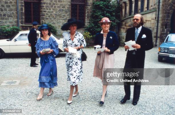 Guest of the wedding of heir to the throne Ernst August von Hanover with Chantal Hochuli at Marienburg castle near Hanover, Germany, 1981.