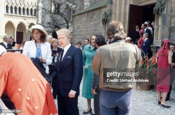 Guest of the wedding of heir to the throne Ernst August von Hanover with Chantal Hochuli at Marienburg castle near Hanover, Germany, 1981.