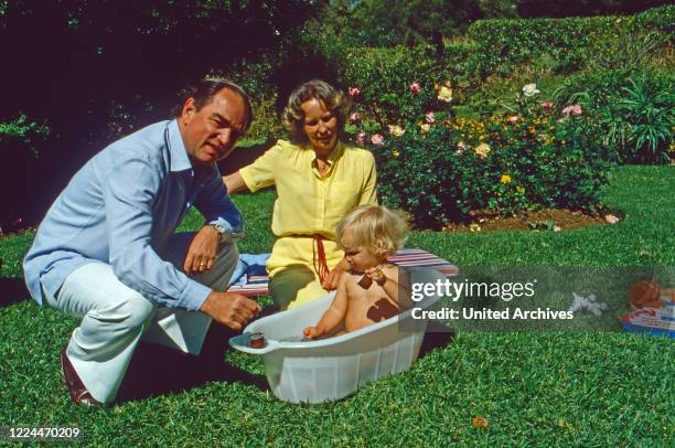 Rudolf Count of Schoenburg Glauchau with his wife Marie Louise, nee of Prussia, and their daughter Sophie at Marbella, Spain, 1983.