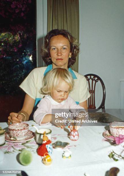 Rudolf Count of Schoenburg Glauchau with his wife Marie Louise, nee of Prussia, and daughter Sophie having easter breakfast, Germany, 1982.