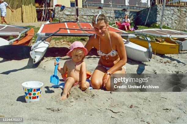 Sophie von Schoenburg Glauchau an her Nanny enjoying the summer at Marbella, Spain, 1983.