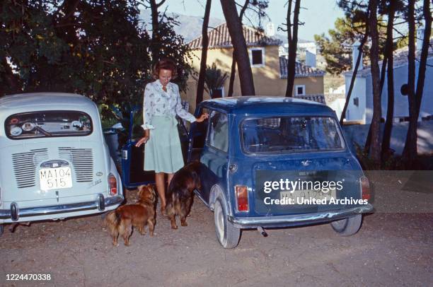 Marie Louise Princess von Schoenburg Glauchau, nee of Prussia, with her Austin Mini Cooper at Marbella, Spain, 1983.