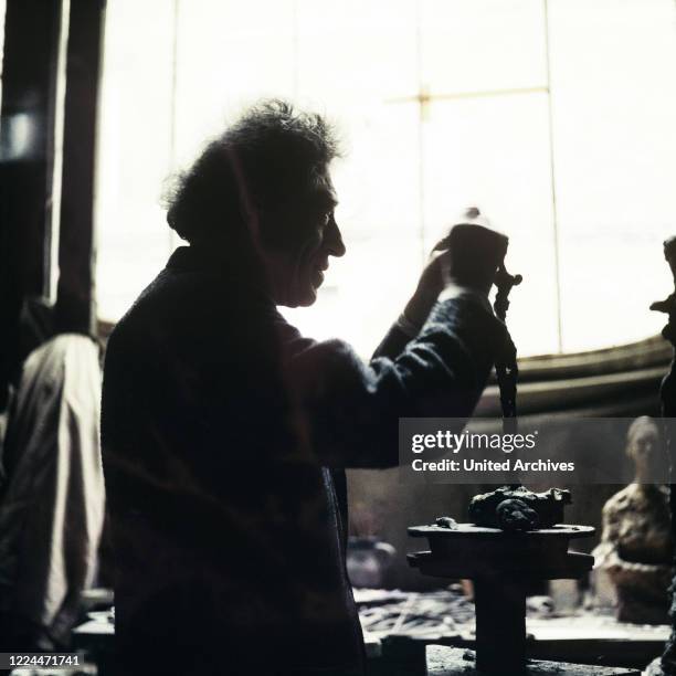 Swiss sculptor, painter and graphic artist Alberto Giacometti at his studio in Paris, France 1962.