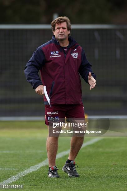 Sea Eagles head coach Des Hasler watches his team train during a Manly Warringah Sea Eagles NRL training session at the Sydney Academy of Sport on...