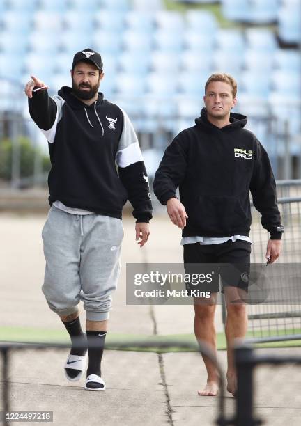 Aaron Woods and Matt Moylan arrive during a Cronulla Sharks NRL training session at Shark Park on May 13, 2020 in Sydney, Australia.