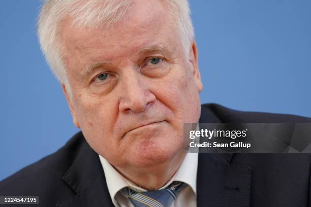 German Interior Minister Horst Seehofer speaks to the media to announce new policies regarding Germany's borders during the coronavirus crisis on May...