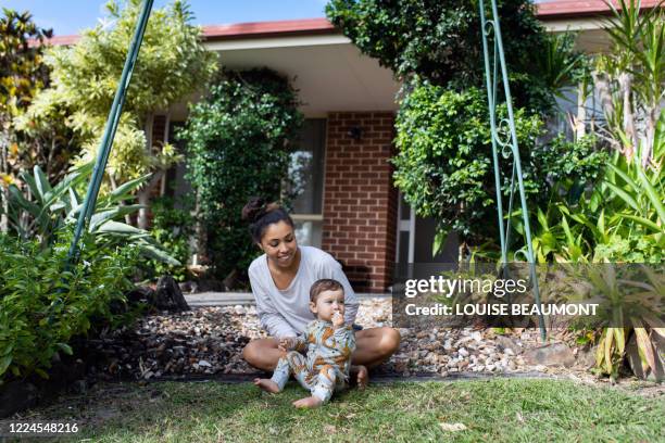 mum and daughter at home - family smiling at front door stock pictures, royalty-free photos & images