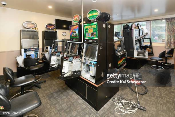 Unused poker machines are seen at the Grand Hotel on May 13, 2020 in Akaroa, New Zealand. While the hotel will remain closed for the season, owner...