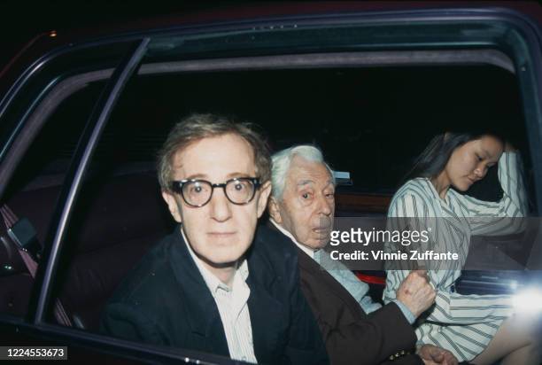 American film director, actor and comedian Woody Allen with his father, Martin Konigsberg , and partner Soon-Yi Previn after watching the New York...