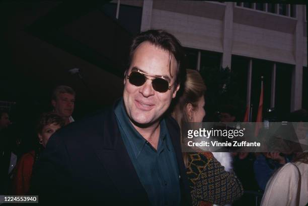 Canadian actor and comedian Dan Aykroyd beside his wife, American actress Donna Dixon, holding their daughter Danielle Aykroyd, at the premiere of...