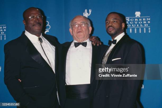 American actor John Amos, American actor Ed Asner, and American actor LeVar Burton attend the 3rd Annual Screen Actors Guild of America Awards, held...