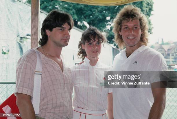 Canadian ice hockey player Ron Greschner, with his wife American fashion model and actress Carol Alt, and Canadian ice hockey player Ron Duguay...