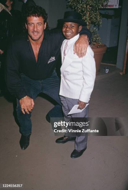 American football player Lyle Alzado with American actor Gary Coleman attend the grand opening of Alzado's, his restaurant in West Hollywood,...