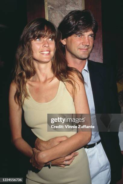 American fashion model and actress Carol Alt and her husband, Canadian ice hockey player Ron Greschner, circa 1990.