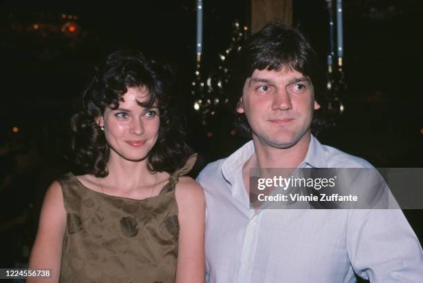 American fashion model and actress Carol Alt and her husband, Canadian ice hockey player Ron Greschner, circa 1985.