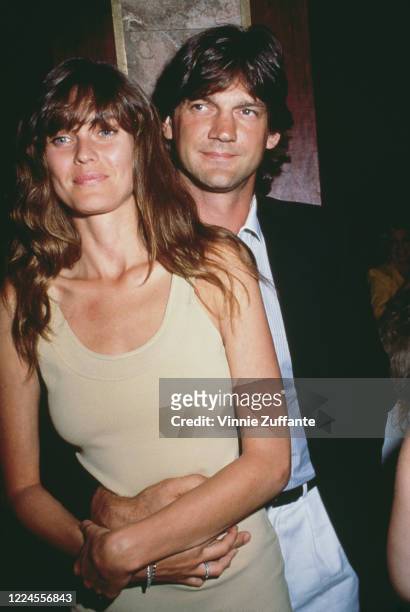American fashion model and actress Carol Alt and her husband, Canadian ice hockey player Ron Greschner, circa 1990.