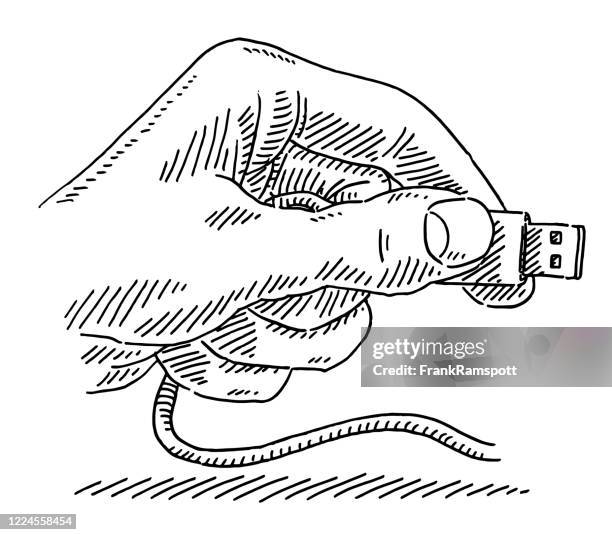 hand holding usb plug drawing - hand plugging in stock illustrations