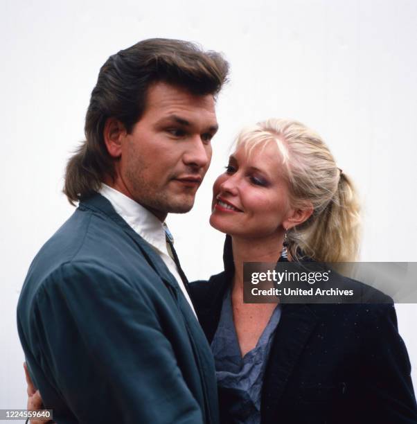 The American actor, singer and dancer Patrick Swayze poses for some portrait shots with his wife Lisa Niemi, circa 1980s.