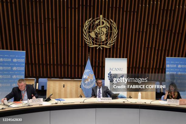 World Health Organization Health Emergencies Programme head Michael Ryan, WHO Director-General Tedros Adhanom Ghebreyesus and WHO Technical lead head...