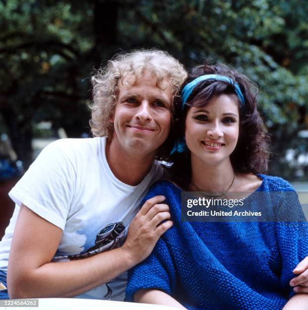 Actress Sonja Tuchmann and Thomas Gottschalk pose for the camera for the film DIE SUPERNASEN, Germany, 1983.