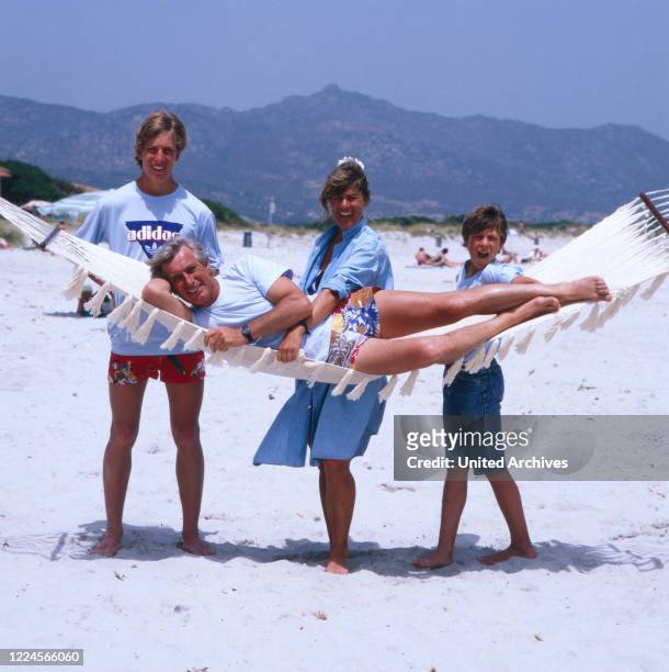 The german actor Siegfried Rauch with his family at the beach, probably Mediterranean 1980.