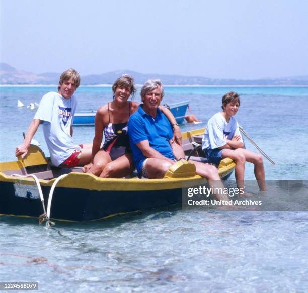 The german actor Siegfried Rauch with his family in a boat, probably Mediterranean Sea 1980.