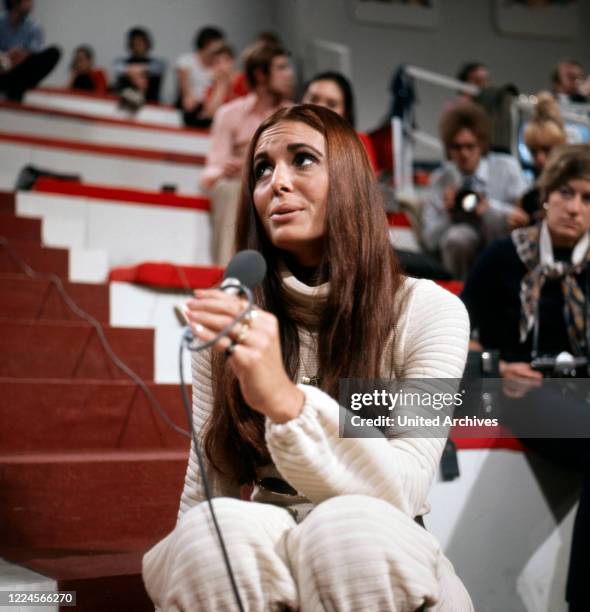 The israeli singer Daliah Lavi at a live performance, Germany, 1970.