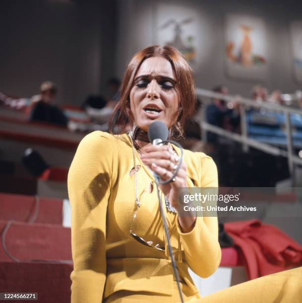 The israeli singer Daliah Lavi at a live performance, Germany, 1970.