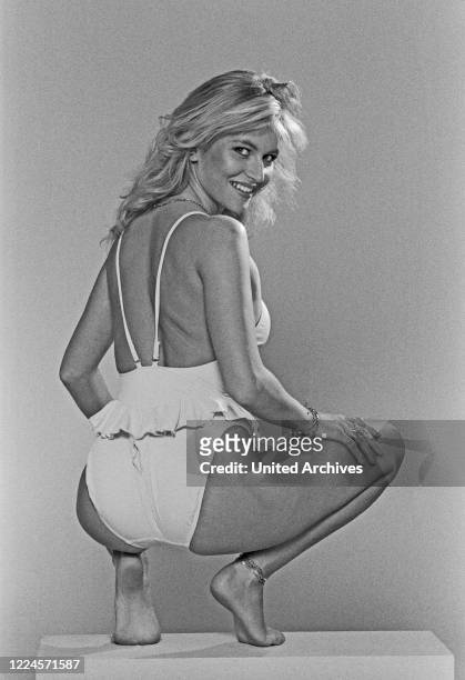 Model and Miss Germany Brigitte Berx, posing in a promotional photo shoot, Germany, 1984.
