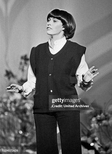 French singer Mireille Mathieu performing on German TV, Germany circa 1981.