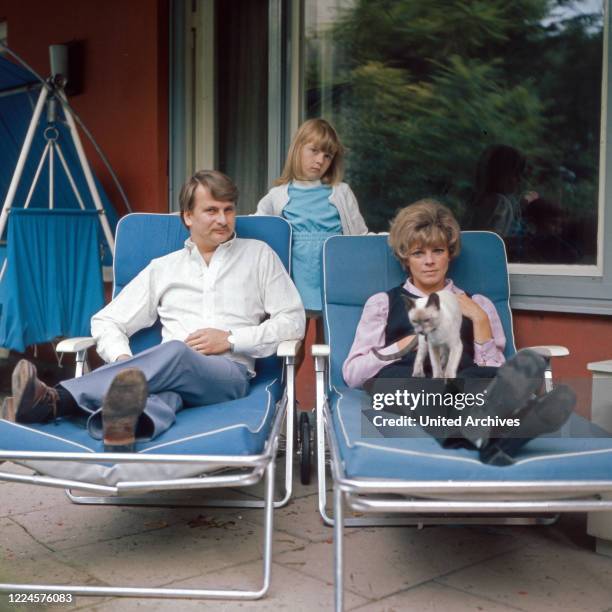 German actress Grit Boettcher with husband Wolfgang Bestler and daughter Nicole, Germany, 1960s.