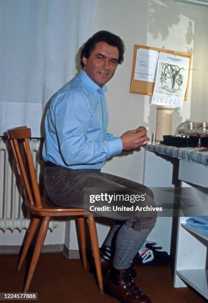 German actor Hans Juergen Baeumler at his wardrobe, Germany, 1980s.