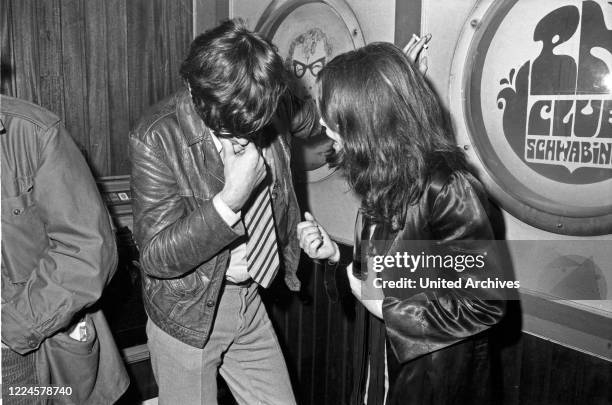 German movie director Rudolf Thome and photo model Uschi Obermaier in Club Schwabing in Munich, Germany, 1968.