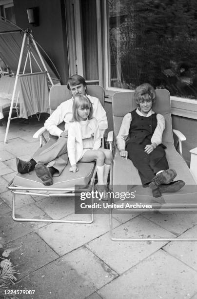 German actress Grit Boettcher with husband Christian Woelffer and daughter Nicole, Germany, 1960s.