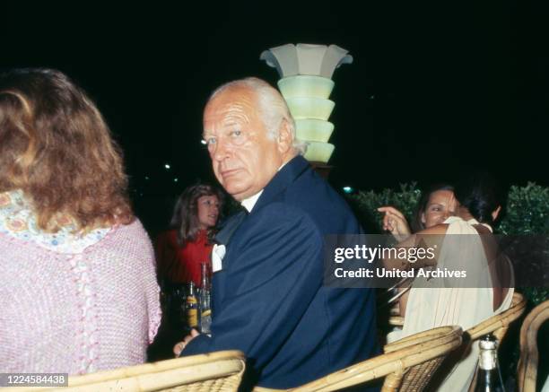 German actor Curd Juergens at an evening event of Cannes film festival, May 1978 Germany, 1970s.