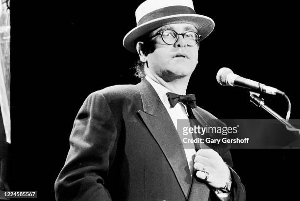 English Pop musician Elton John speaks onstage during the Third Annual Rock and Roll Hall of Fame Awards ceremony at the Waldorf Astoria Hotel, New...