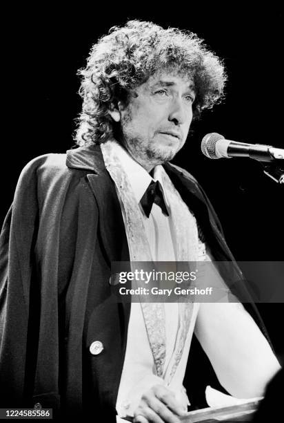 American Folk and Pop musician Bob Dylan speaks onstage during his induction at the Rock and Roll Hall of Fame Awards at the Waldorf Astoria, January...