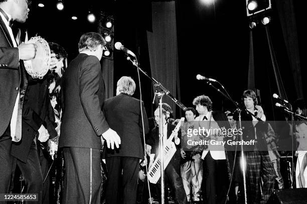 Members of the Rock Hall Jam Band perform onstage during the Third Annual Rock and Roll Hall of Fame Awards ceremony at the Waldorf Astoria Hotel,...