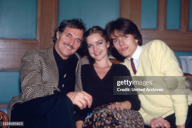 Actors Harald Leipnitz , Dietlinde Turban and Alfon Haiser on a sofa, Germany, 1980s.