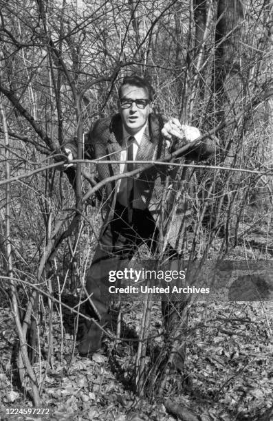 Austrian bassist, singer and producer Andy Fisher at and around Munich, Germany, 1960s.