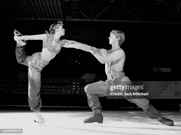 Portrait of English figure skating duo Jayne Torvill and Christopher Dean as they perform on ice, November 1986. The pair were the 1984 Olympic gold...