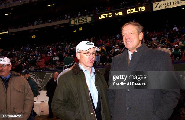 New York Jets Owner Woody Johnson chats with New York State Governor George Pataki when he attends the New York Jets vs Indianapolis Colts Playoff...