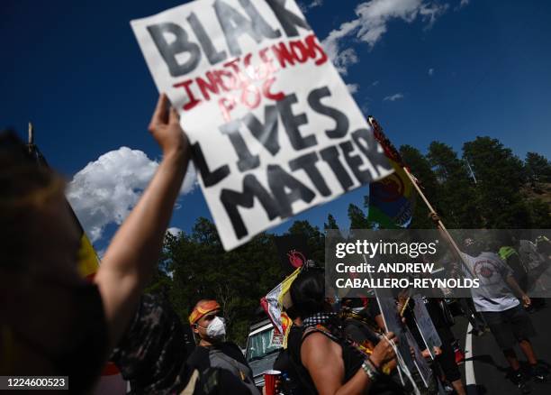 Activists and members of different tribes from the region protest in Keystone, South Dakota on July 3 during a demonstration around the Mount...