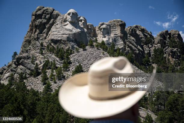 The busts of U.S. Presidents George Washington, Thomas Jefferson, Theodore Roosevelt and Abraham Lincoln stand at Mount Rushmore National Memorial in...
